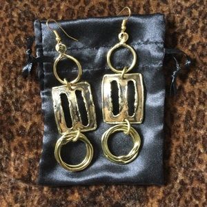 Brand new gold dangle earrings